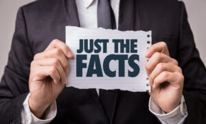 Just the Facts paper sign