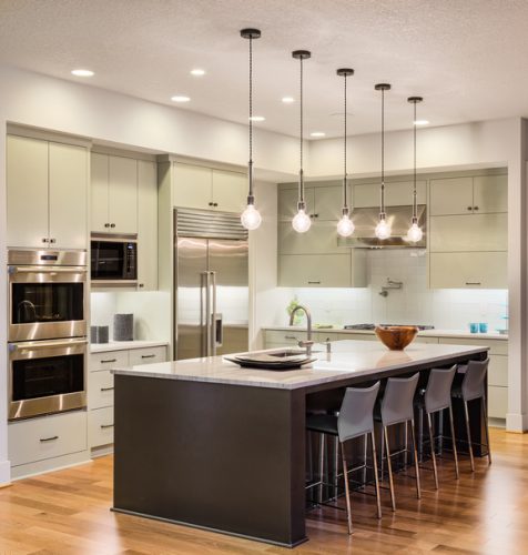 Kitchen with hardwood floor and granite counter tops.