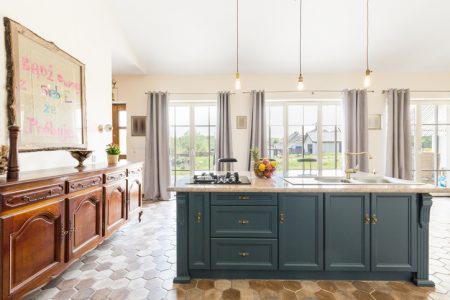 Kitchen with hardwood floor and granite counter tops.