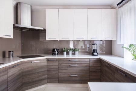 Kitchen with hardwood floor and granite counter tops.