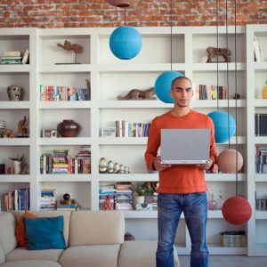 A man with laptop in his hands