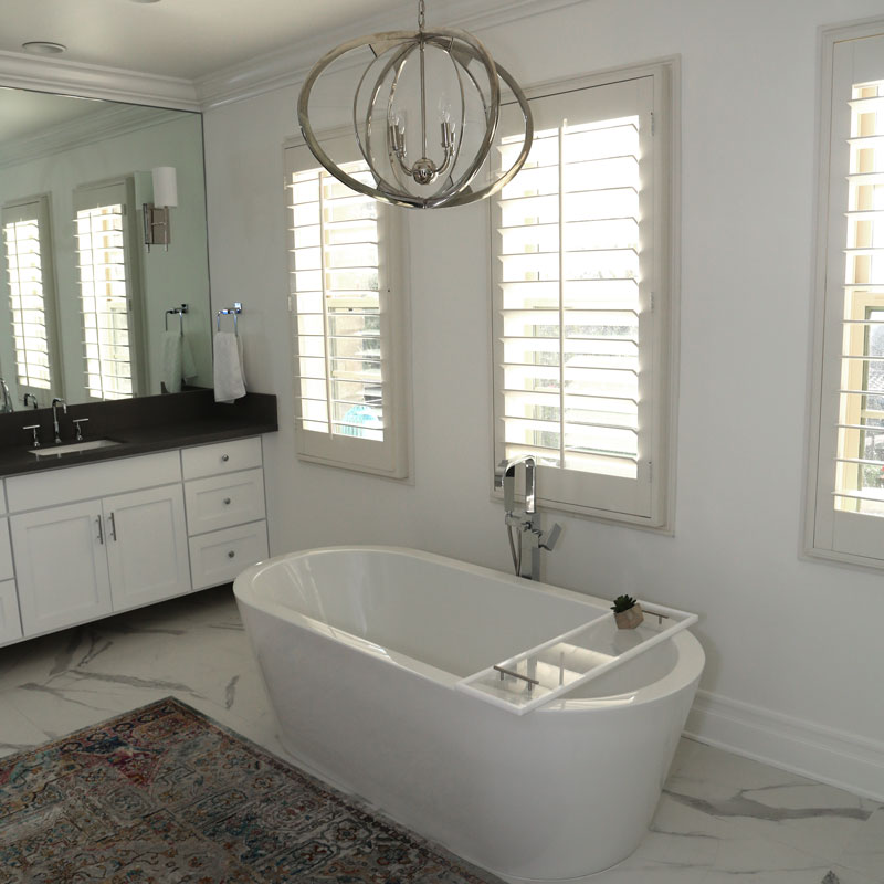 Modern bathroom with white cabinets in Southern CA